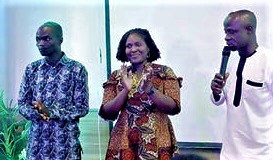 Osman Mamuda (right), Ashanti Regional Director, Ministry of Trade and Industry, launching the GrEEn challenge in Kumasi, while Genevieve Parker-Twum (middle), Senior Incubation and Acceleration Advisor, SNV Ghana, and Eric Oti Nyamekye, Head, Ejisu Business Advisory Centre, applaud